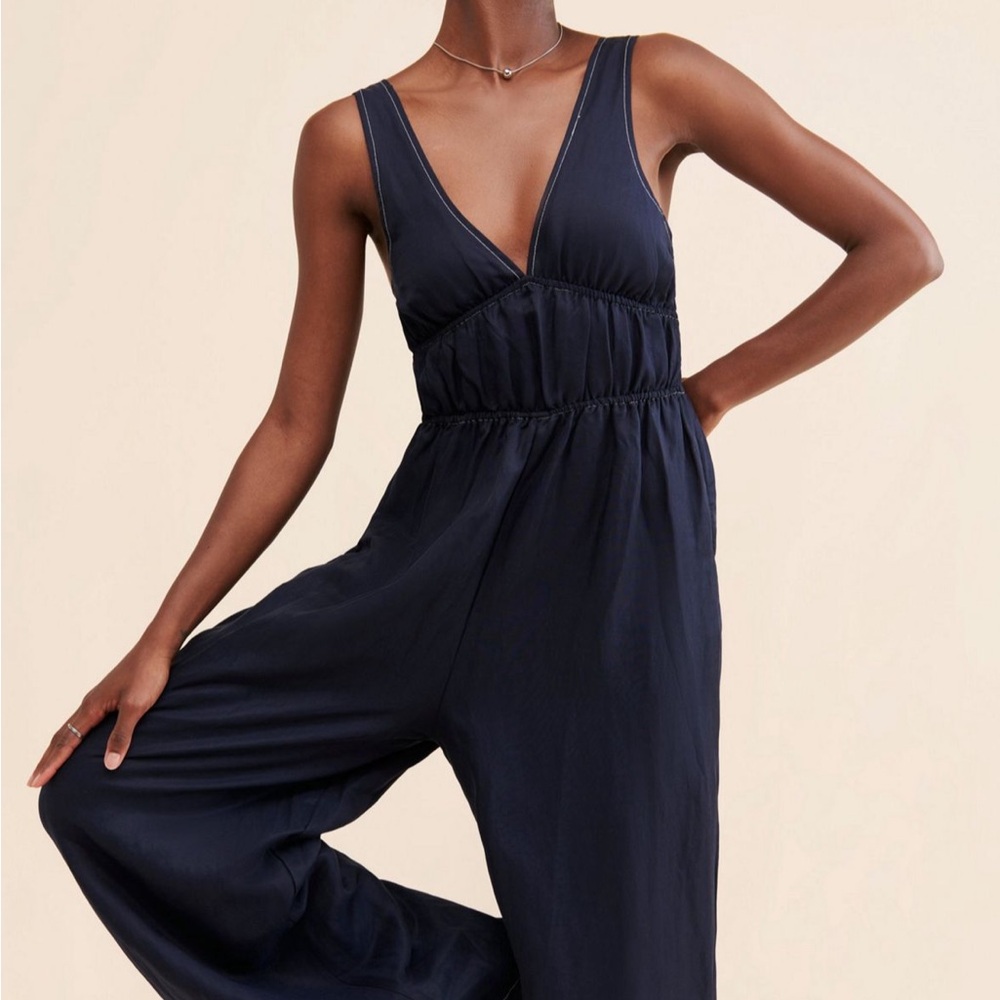 Anthro Jumpsuit with Wide-Leg Design and Deep V-Neckline
